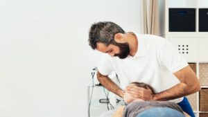 Physiotherapist Treating a Patient for a Neck Injury
