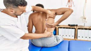Man Visits a Chiropractor for His Chiropractic Session